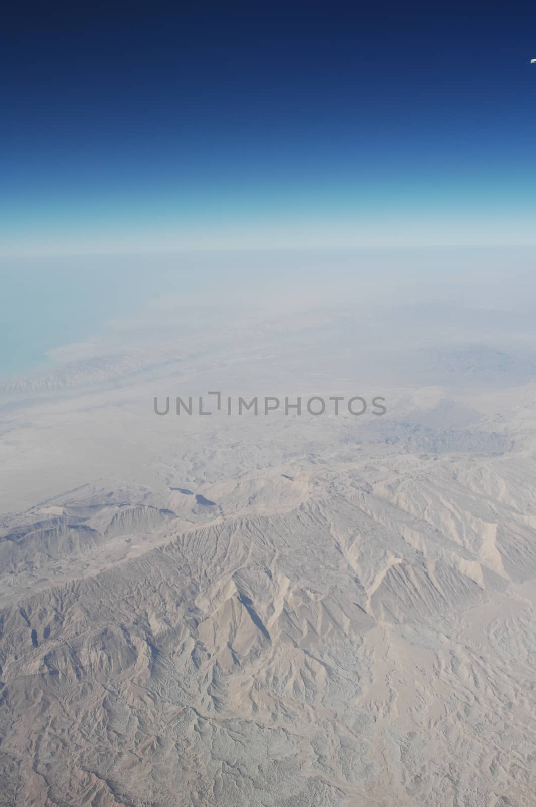 Aerial view of Clouds through flight window