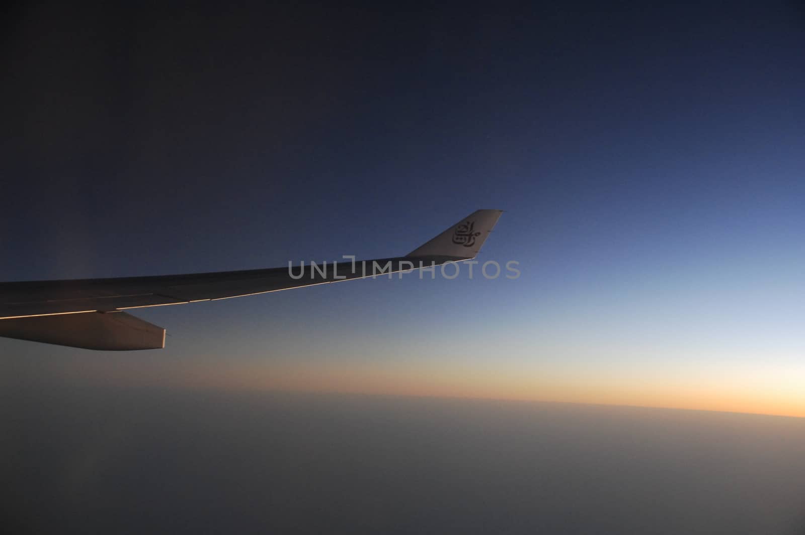 Aerial view of Clouds through flight window