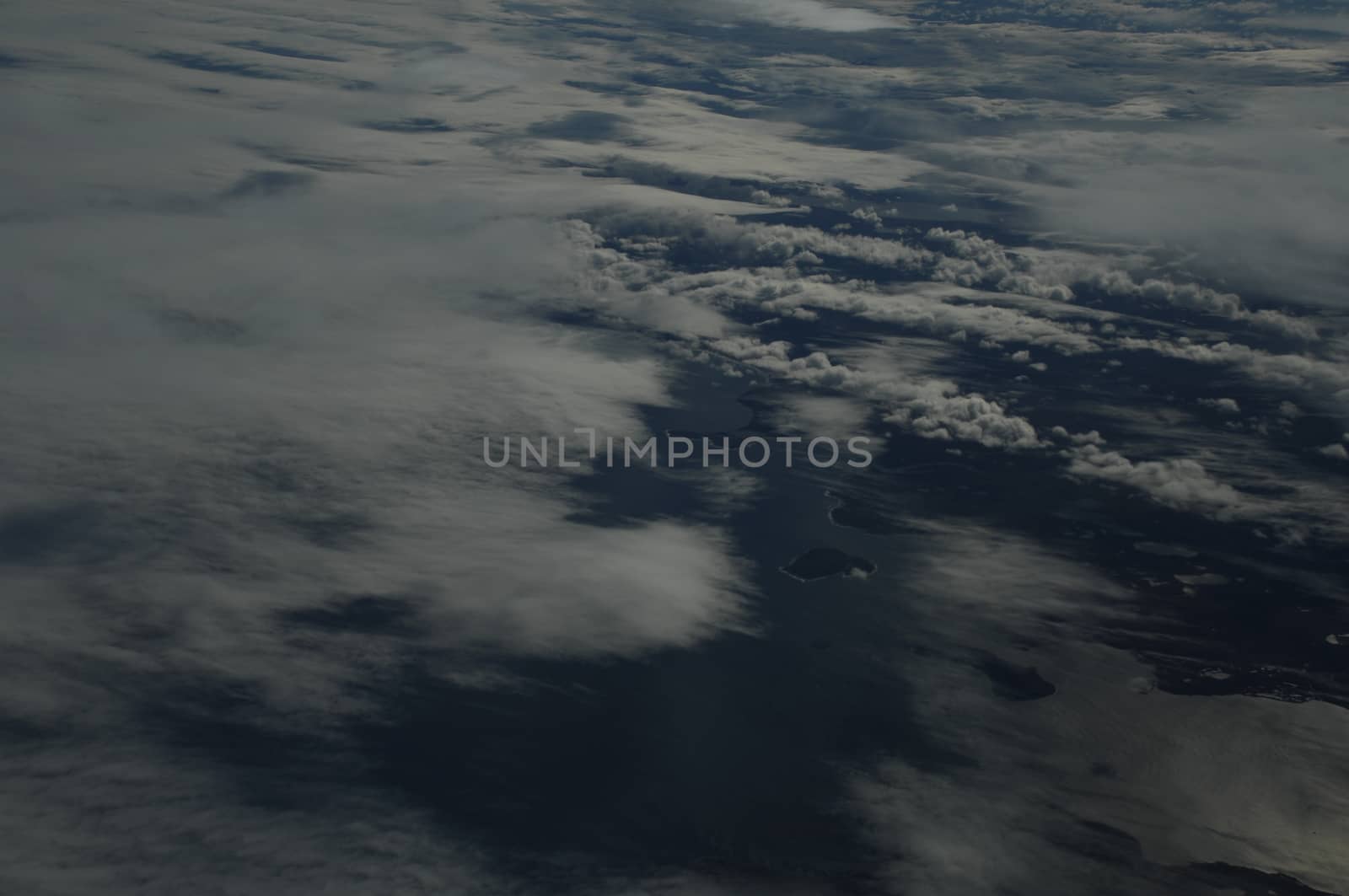Aerial view of Clouds through flight window