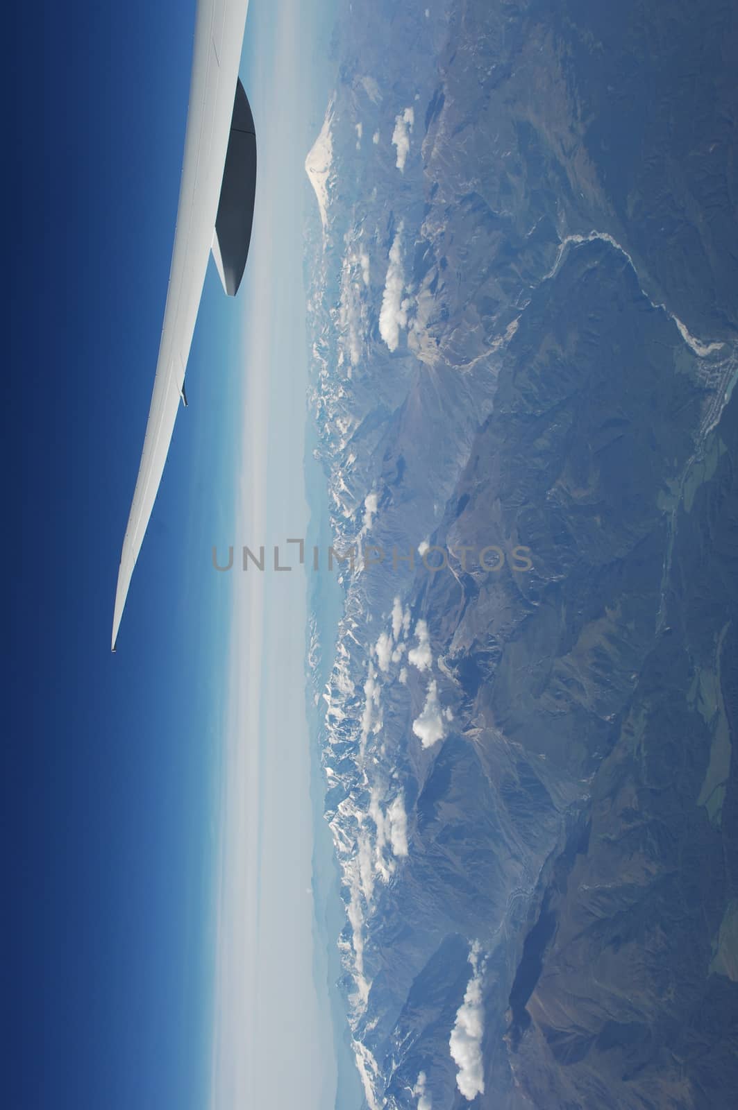 Aerial view of Clouds through flight window