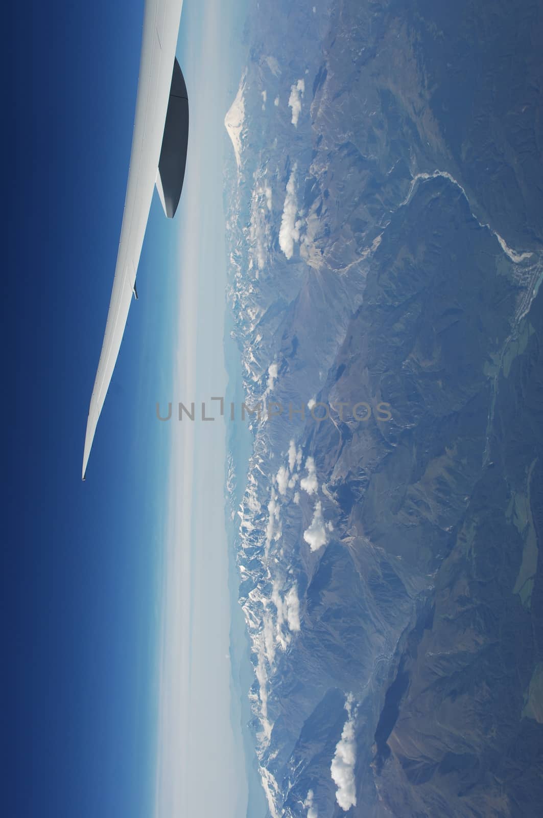 Aerial view of Clouds through flight window