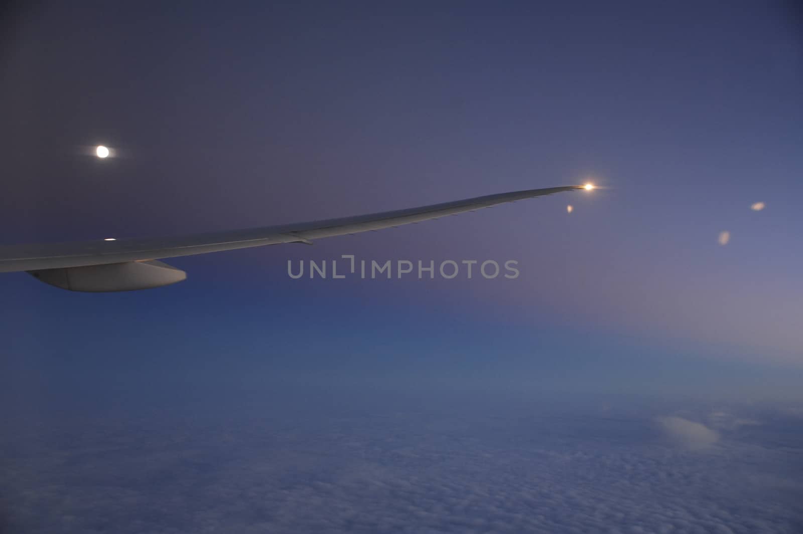 Aerial view of Clouds through flight window