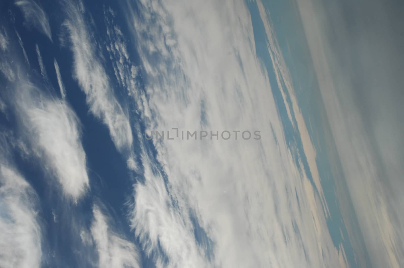 Aerial view of Clouds through flight window