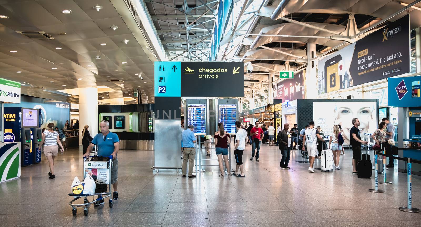 Interior view of Lisbon International Airport where travelers wa by AtlanticEUROSTOXX