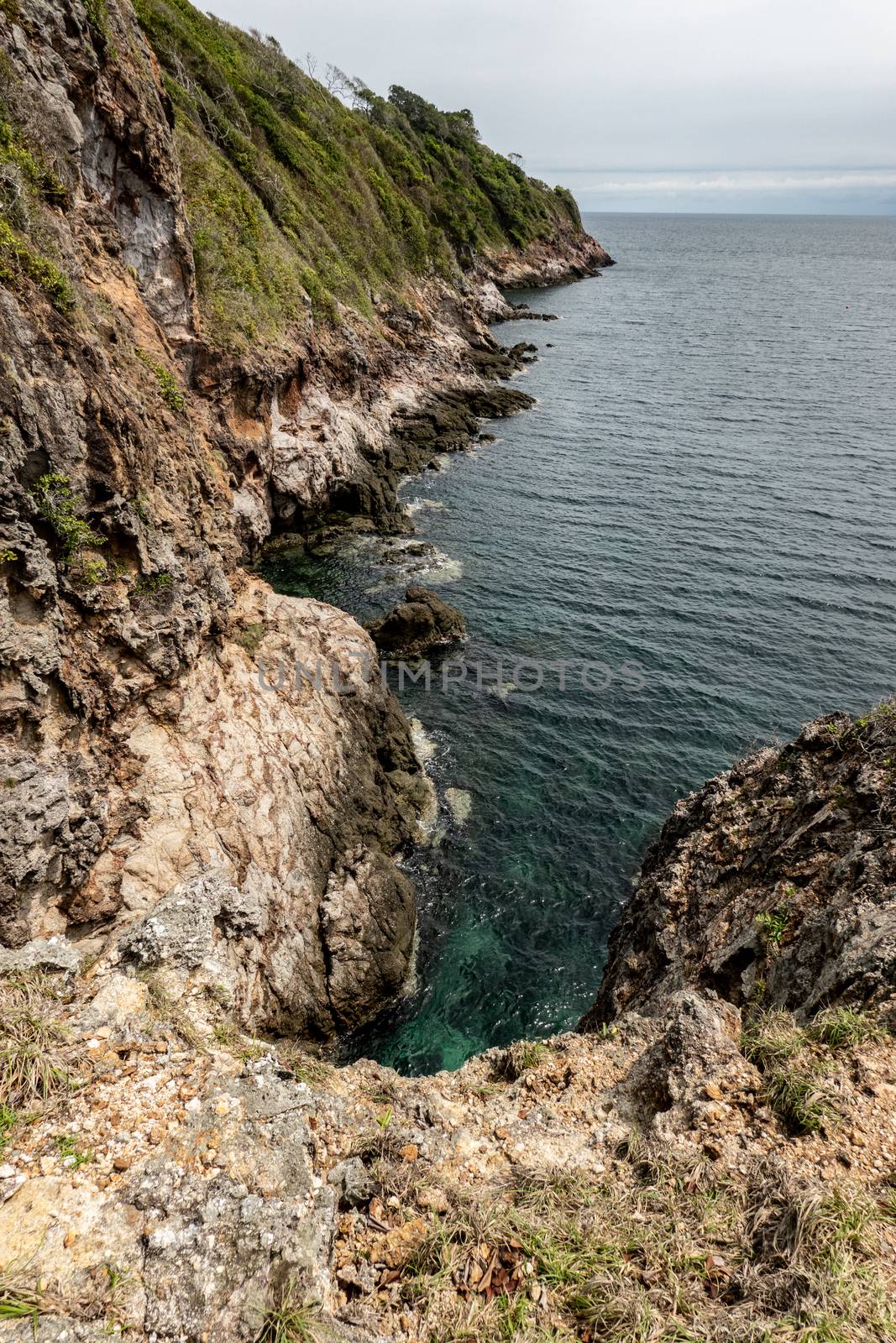 The cliff with sea and blue sky in the morning.