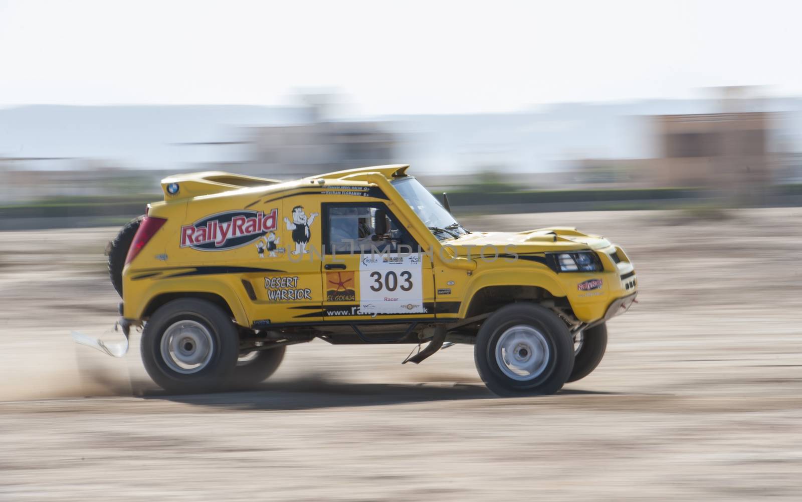 Off-road truck competing in a desert rally by paulvinten