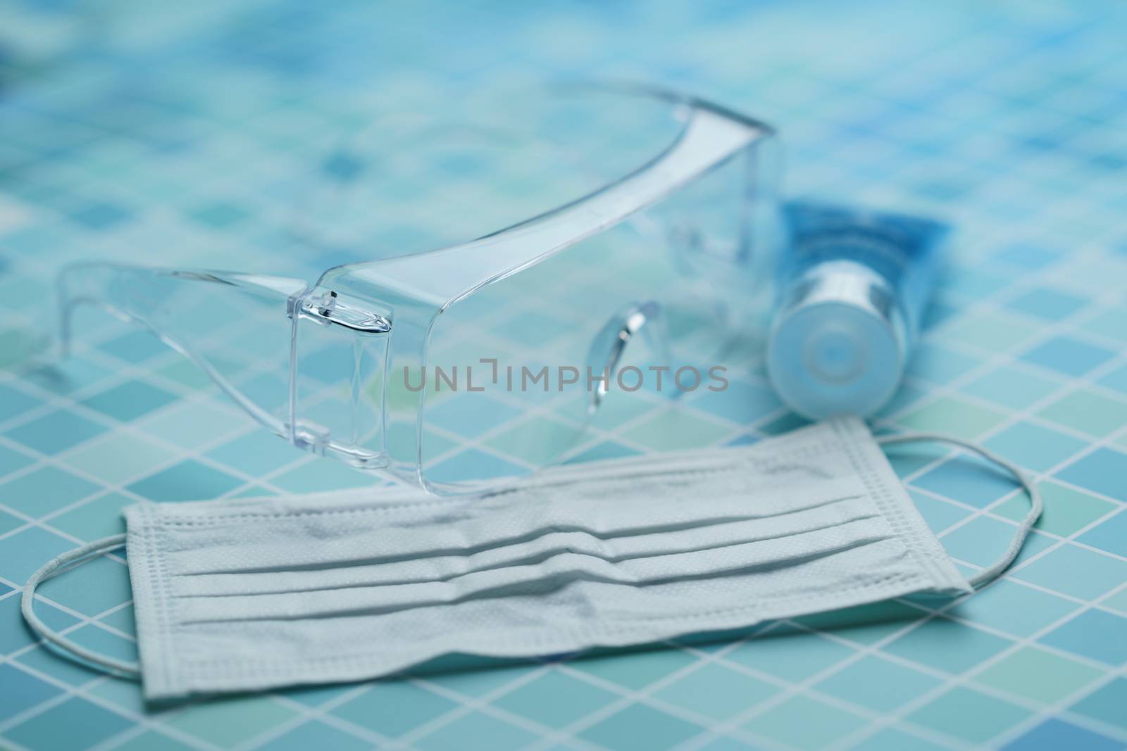 Must have items - protective face mask, glasses and sanitizer g by sirawit99