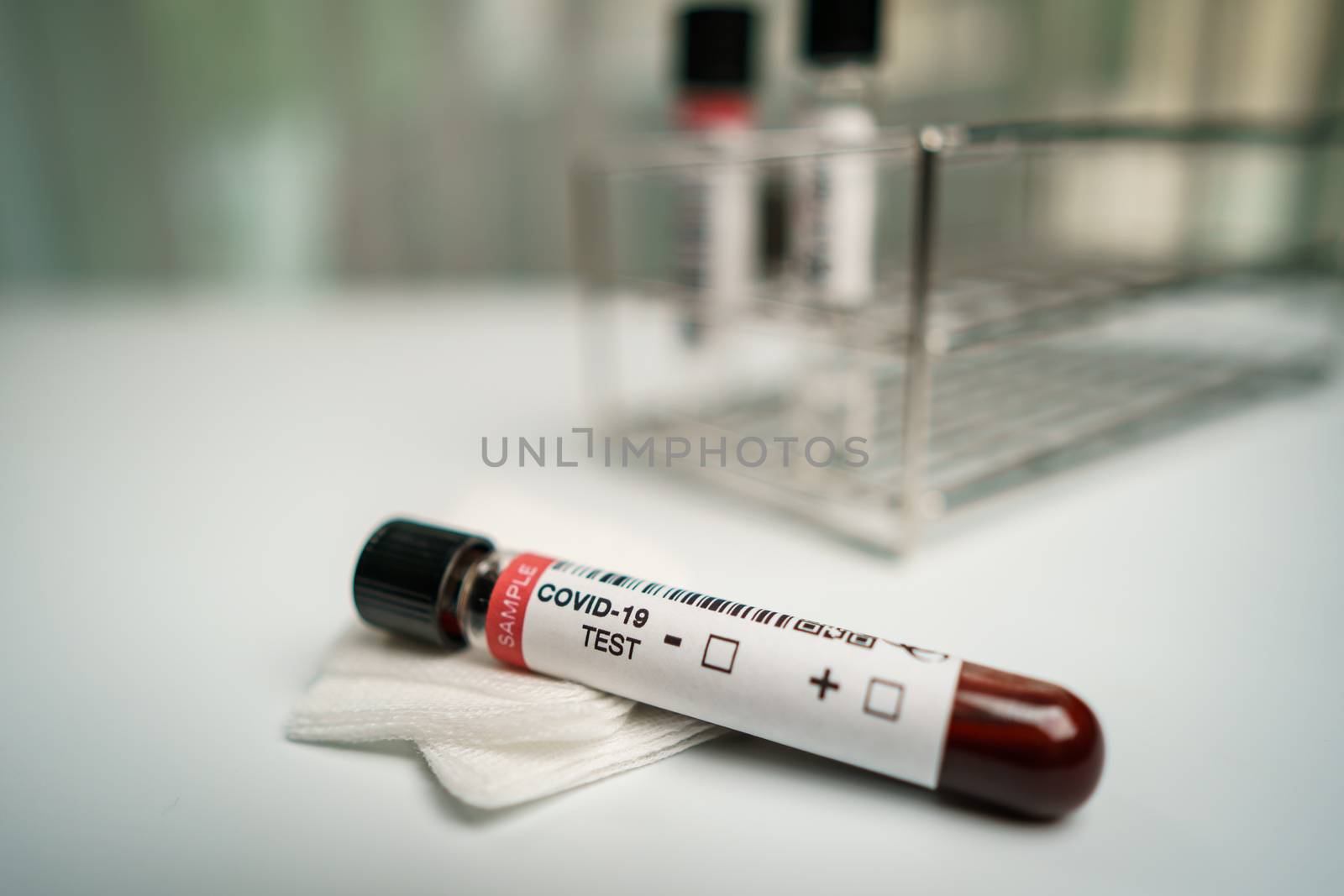 Coronavirus testing, a tube of blood test samples of coronavirus by sirawit99