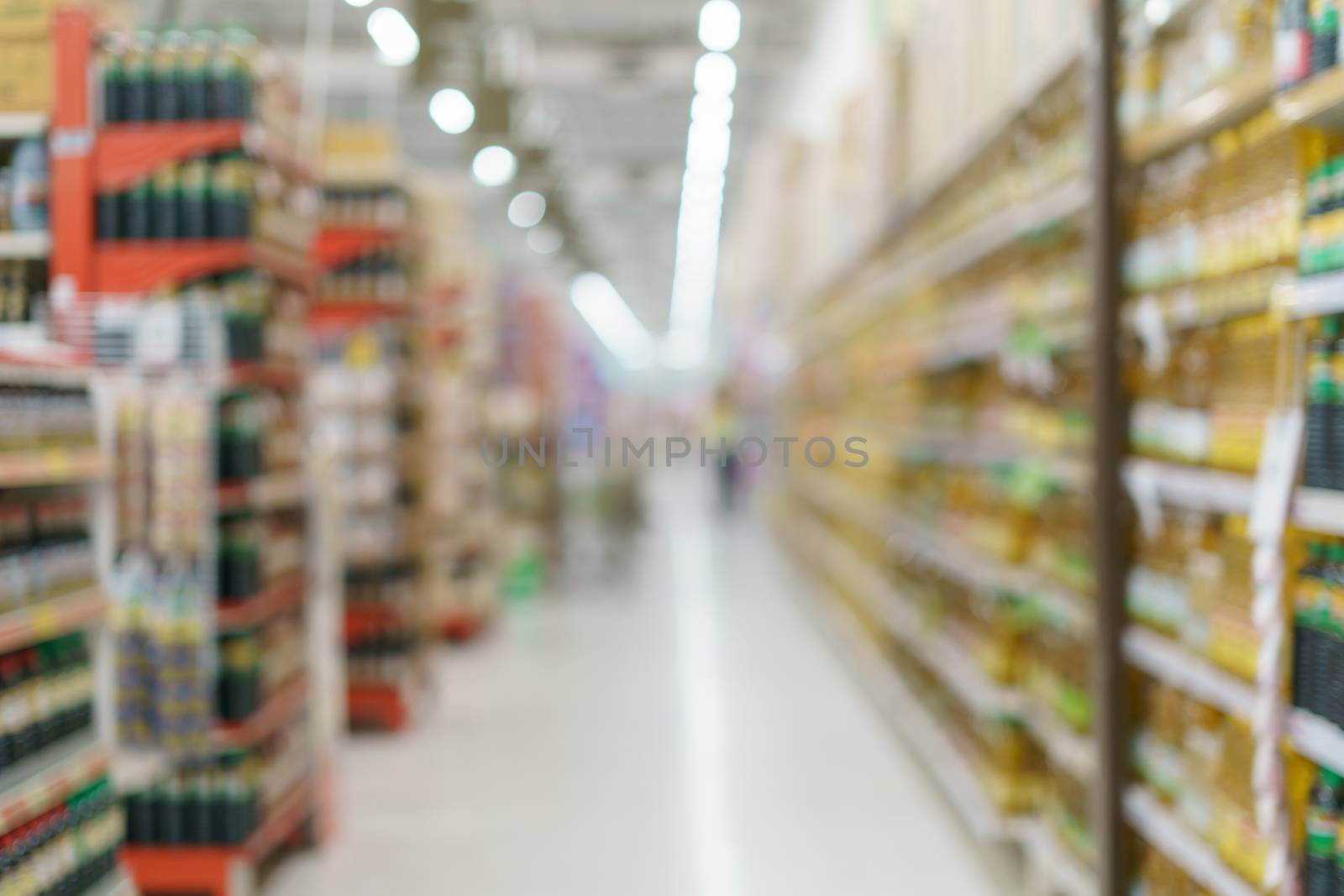 Supermarket blurred background oil bottle and seasoning sauce on by sirawit99