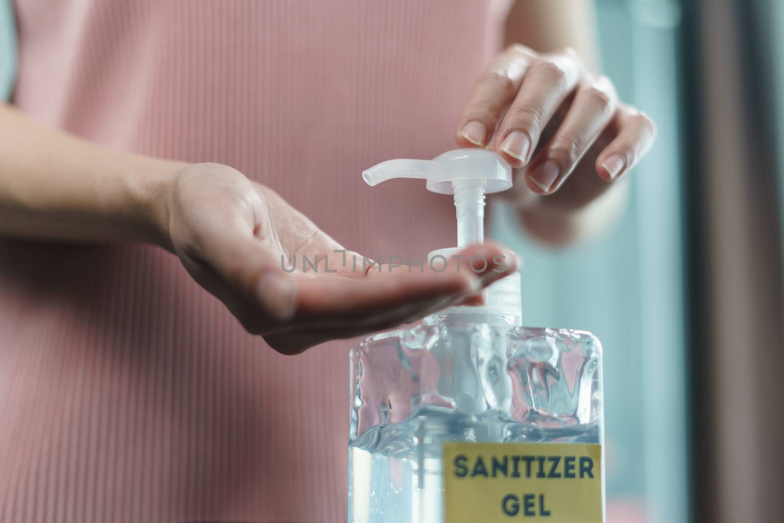 Hand wash with disinfectant gel dispenser during the epidemic covid-19.