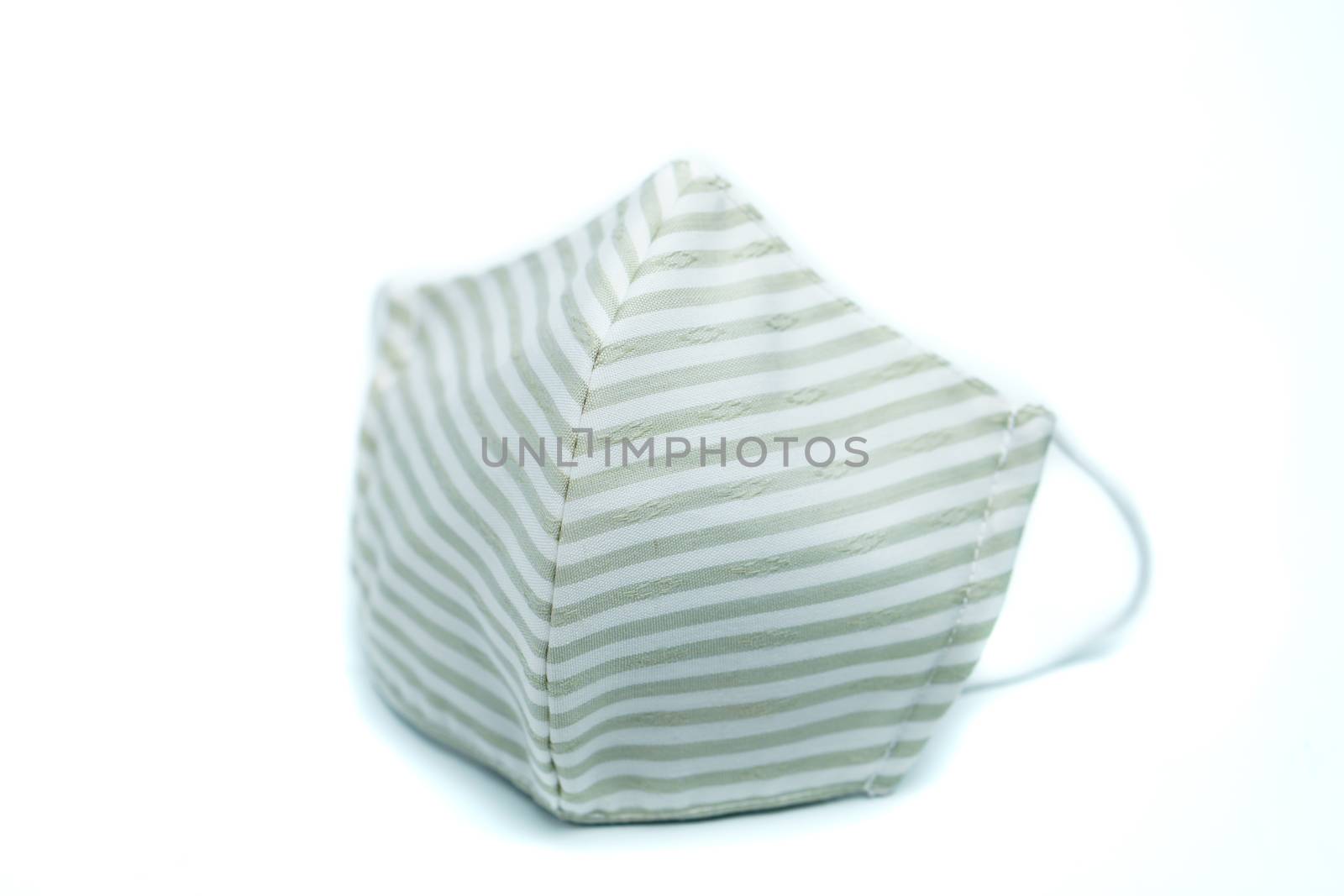 Fabric face mask or protective raspiratory mask for spreading virus on white background. isolated
