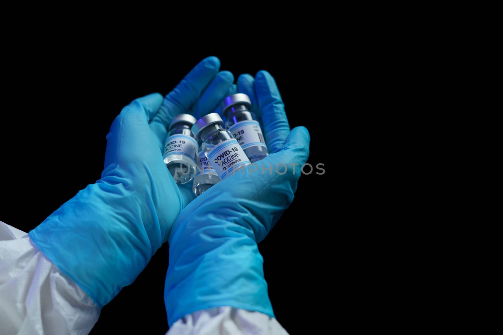 Hand in blue glove holding vaccine and syringe injection for pre by sirawit99