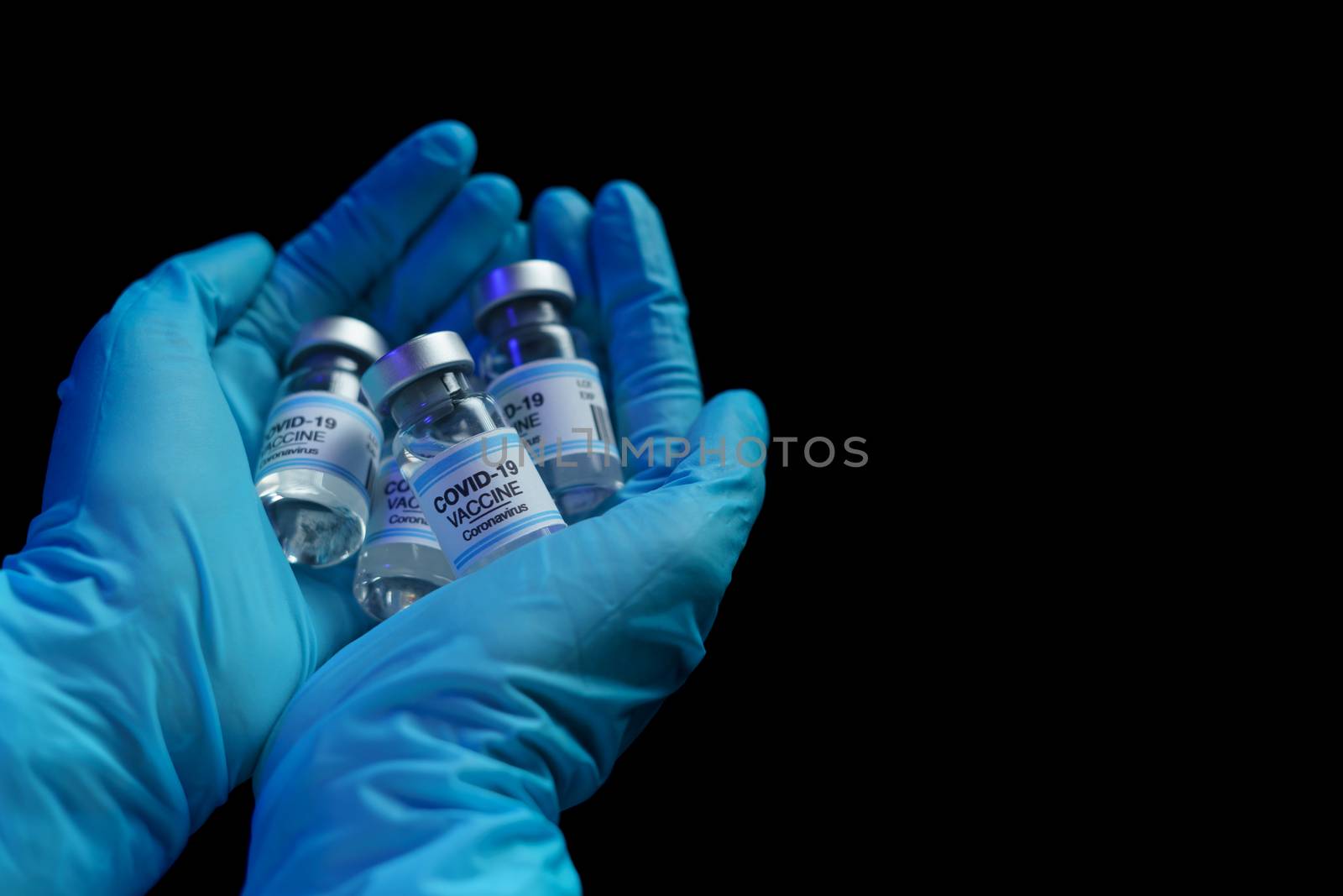 Hand in blue glove holding vaccine and syringe injection for pre by sirawit99