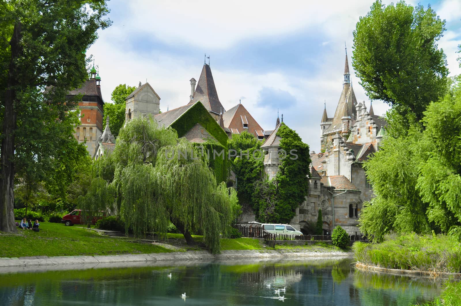 Vajdahunyad Castle with lake in City Park, Budapest, Hungary by chernobrovin