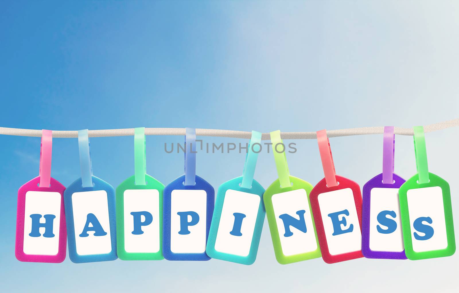 Happiness concept, group of plastic tag and text on blue sky background