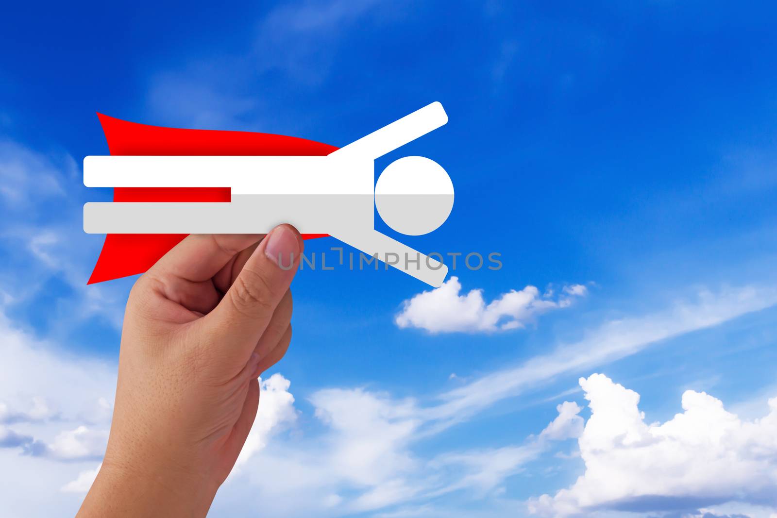 Business success concept, hand holding super hero arrow target to  growth and achievement