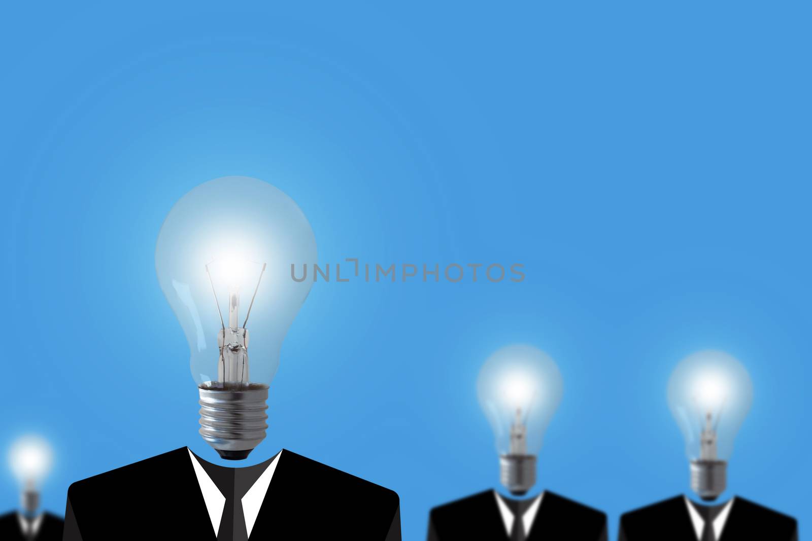 Teamwork concept, light bulb business man on blue background, group leader paper cut people