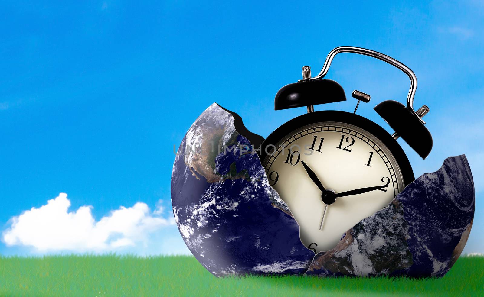 Time management concept, business planning, The Earth and retro clock on green grass , Elements of this Image Furnished by NASA