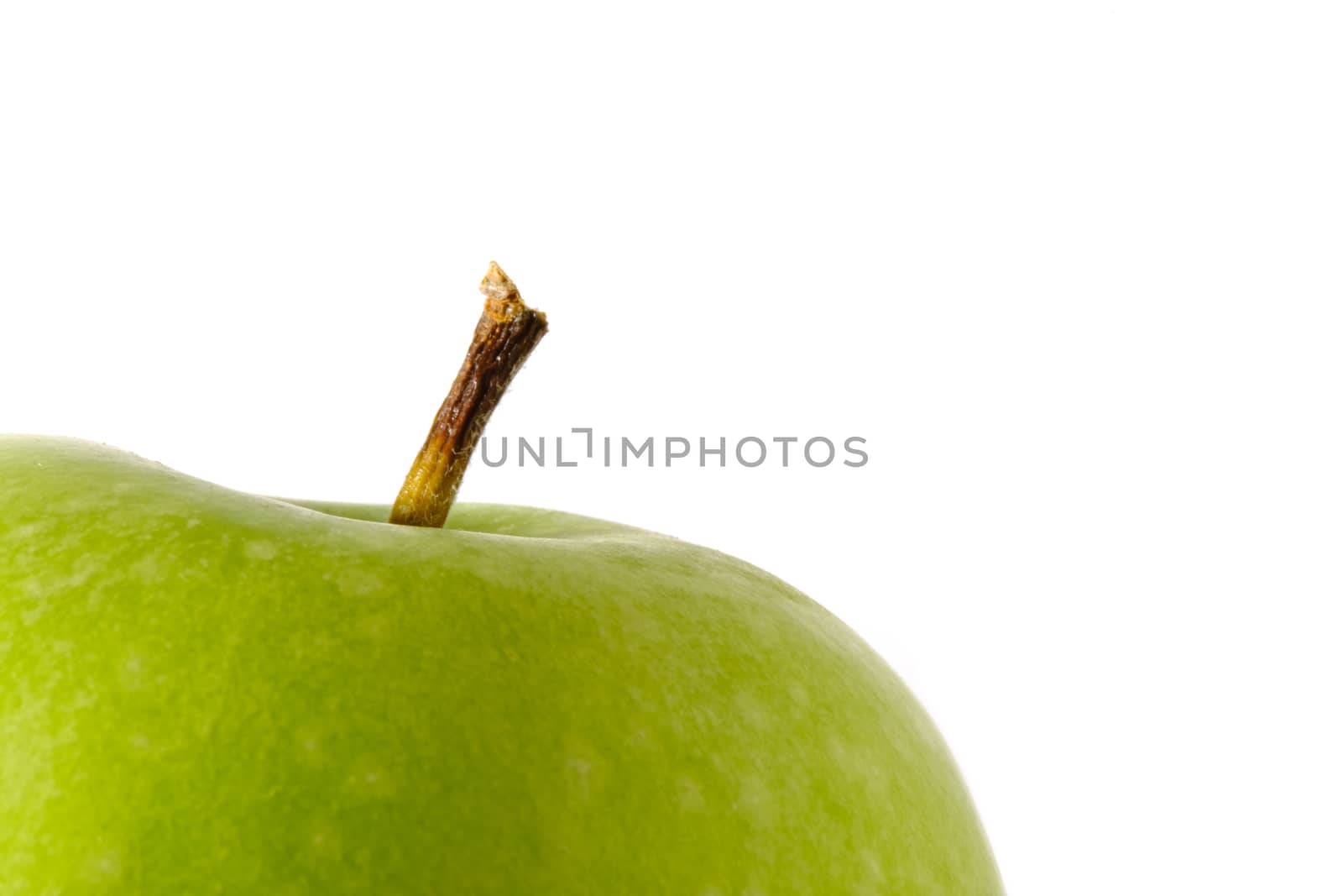 Close up green Apple granny smith isolated on white background – macro shoot