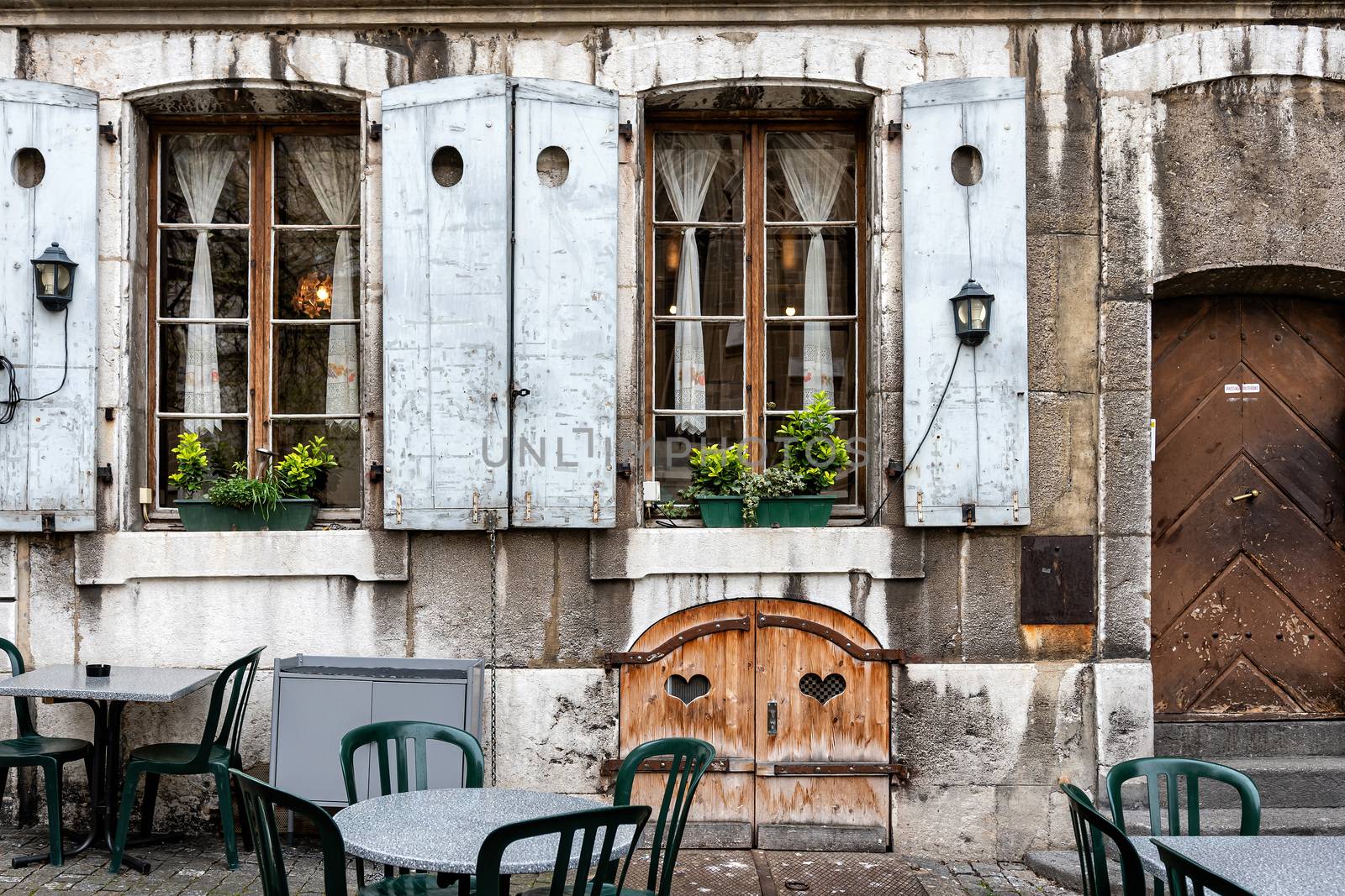 Outdoor cafe at the old building in the old town of Geneva - image