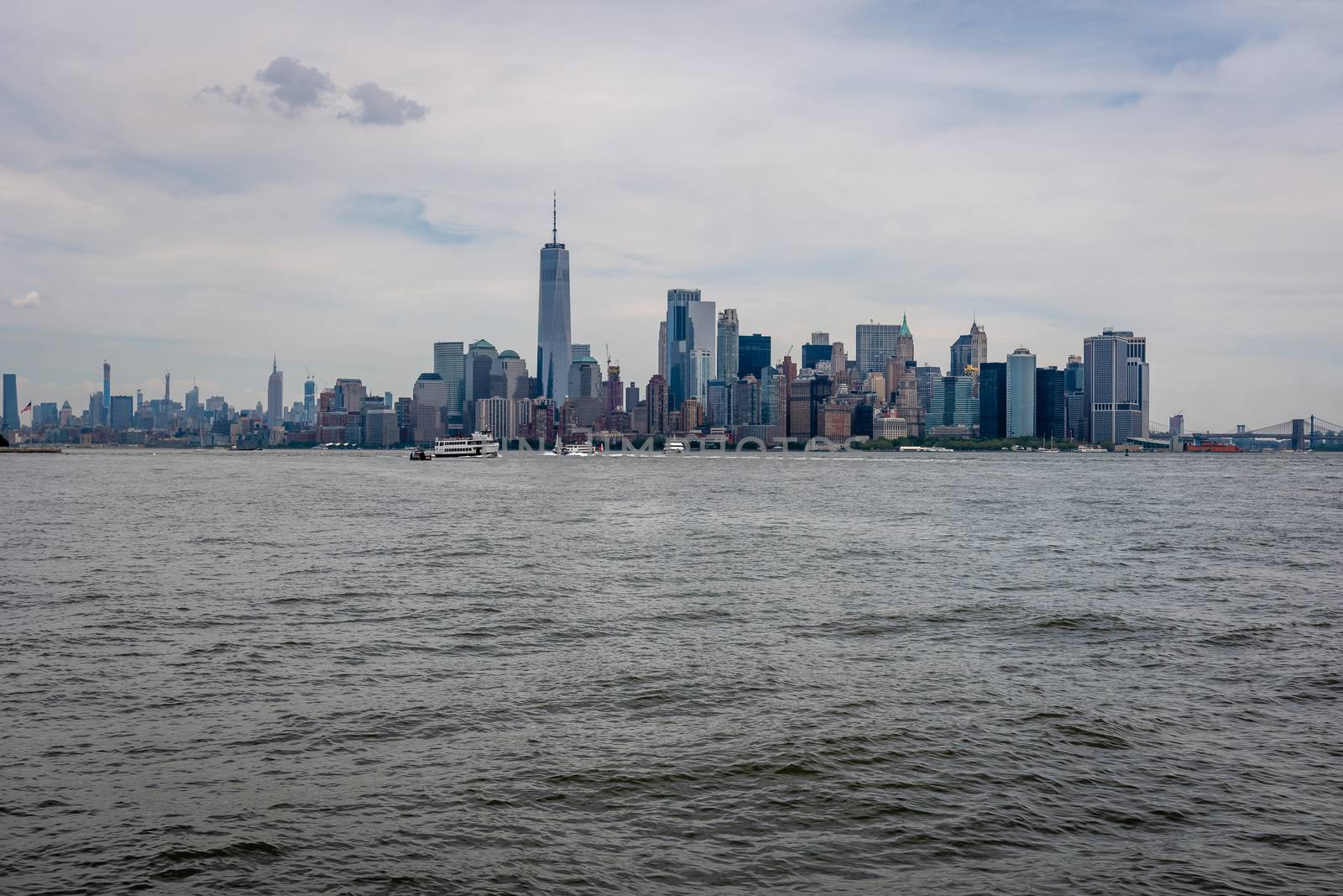 Skyline and modern office buildings of Midtown Manhattan viewed from across the Hudson River. - Image