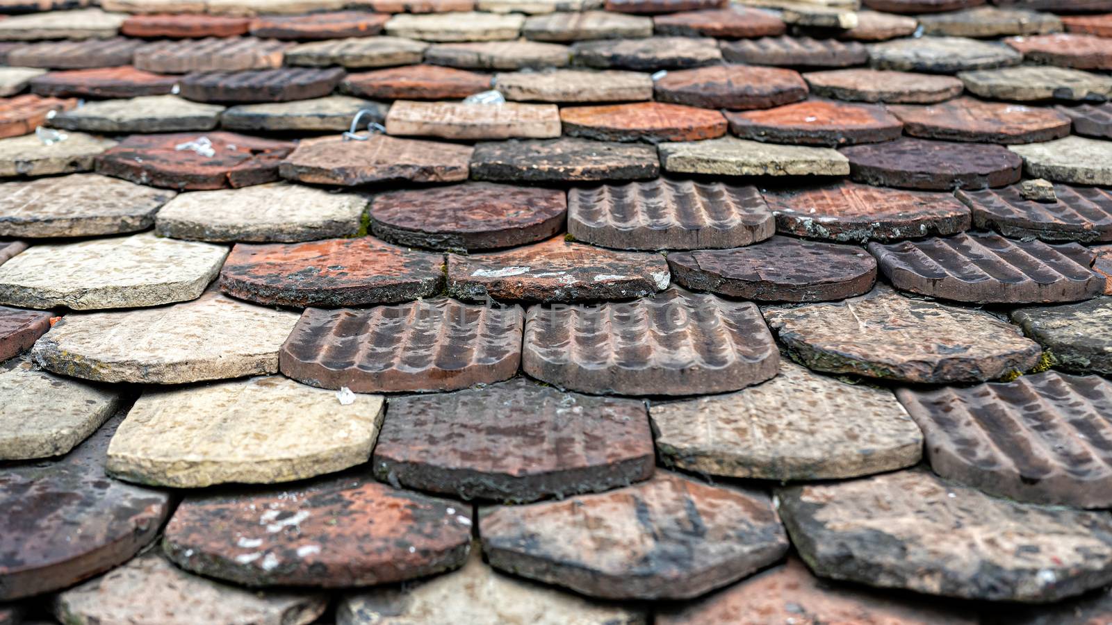 ceramic roof tiles on an old roof, Geneva, Switzerland - image