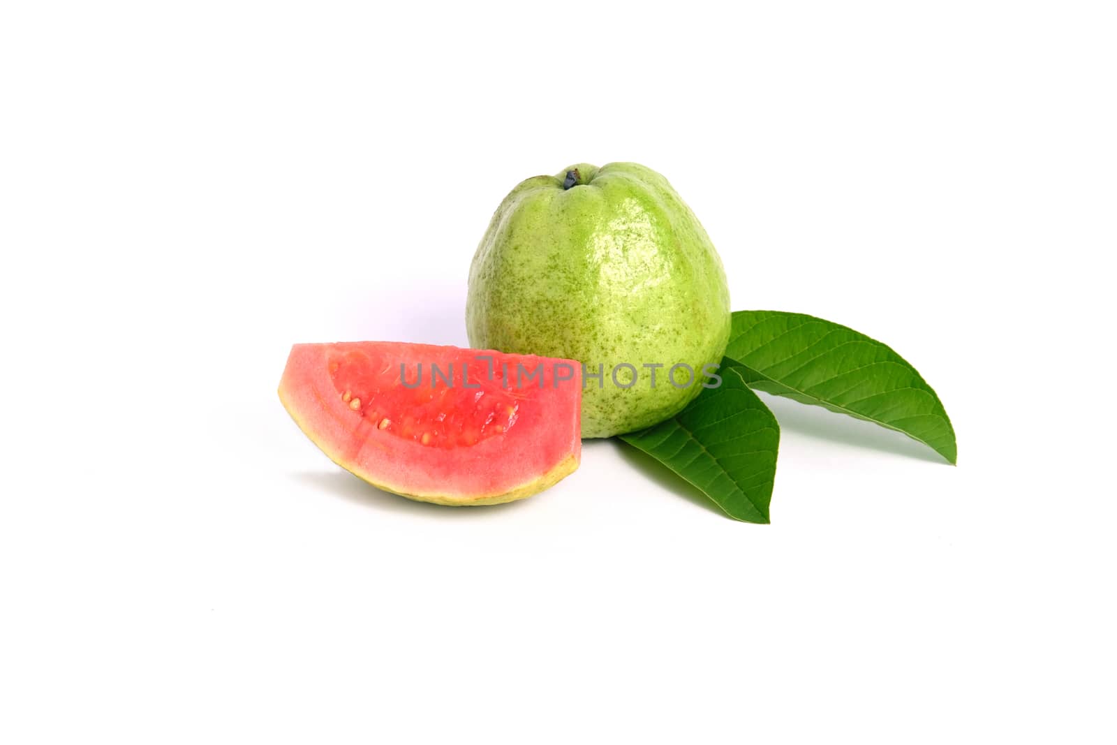 Fresh Psidium guajava / common guava / lemon guava sliced and raw fruit isolated on a white background