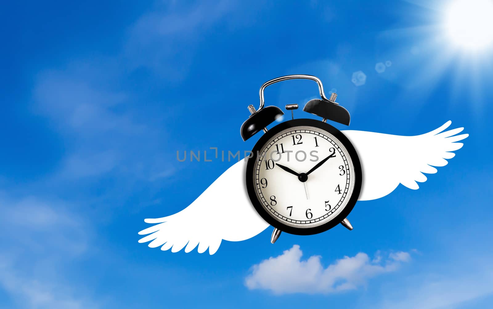 Time management concept, business planning, flying alarm clock on blue sky background