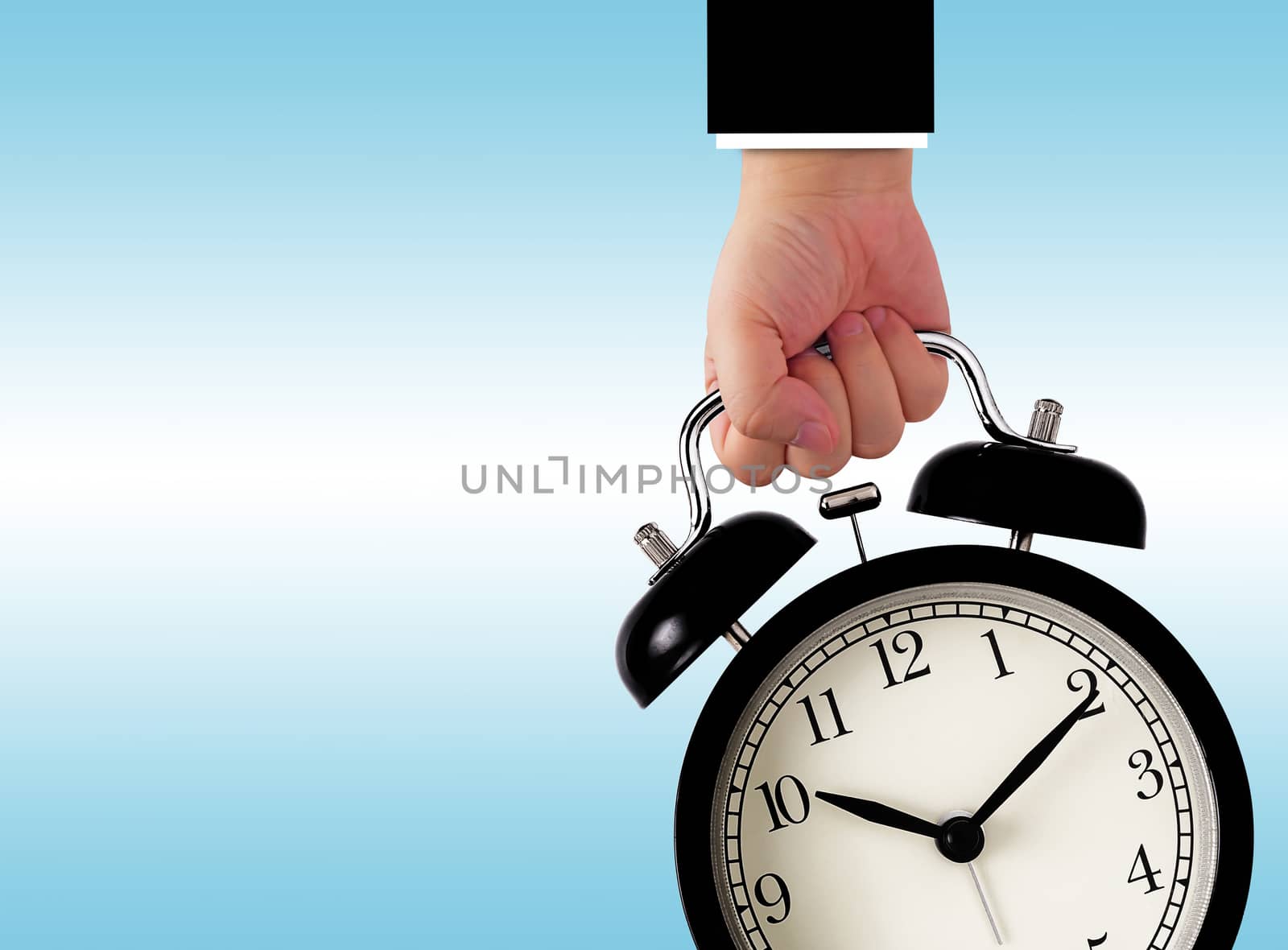 Time management concept, business planning, hand holding alarm clock