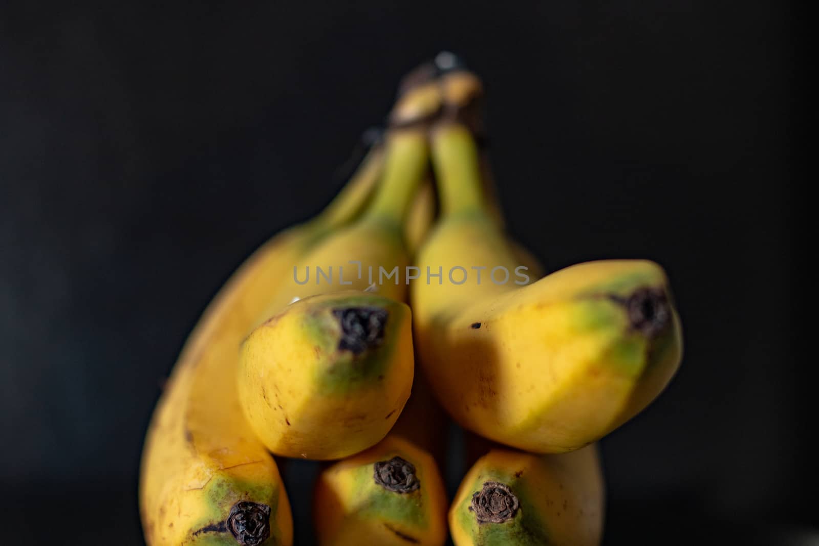 Group of bananas on a black background