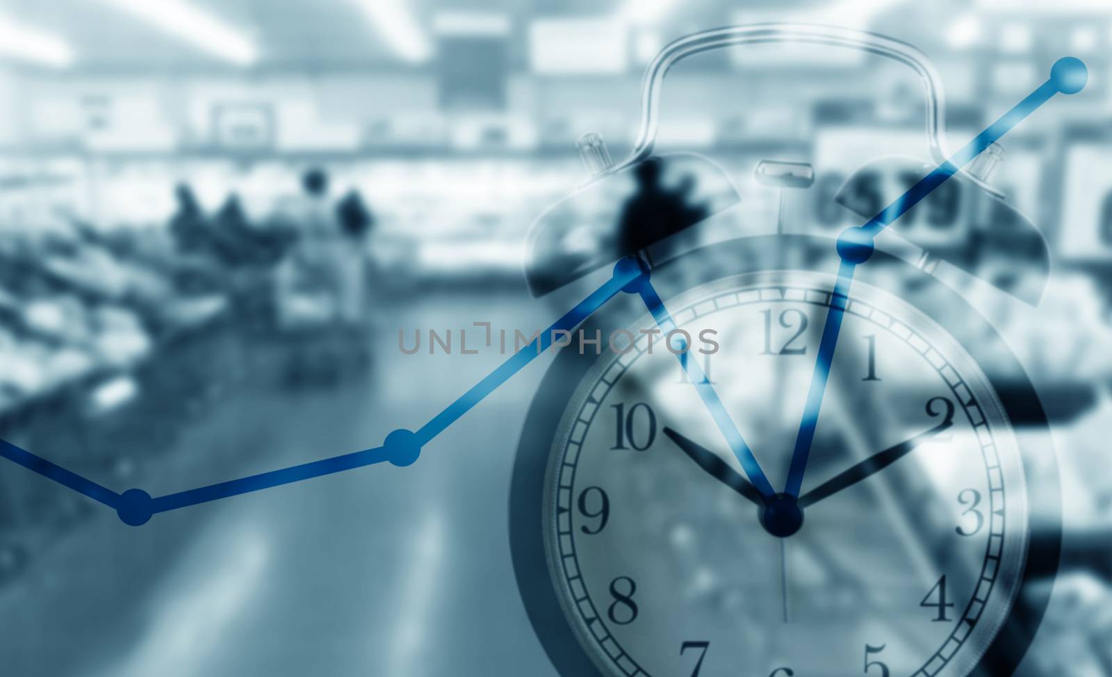 Time management concept, business planning, alarm clock and growing graph on blue background 