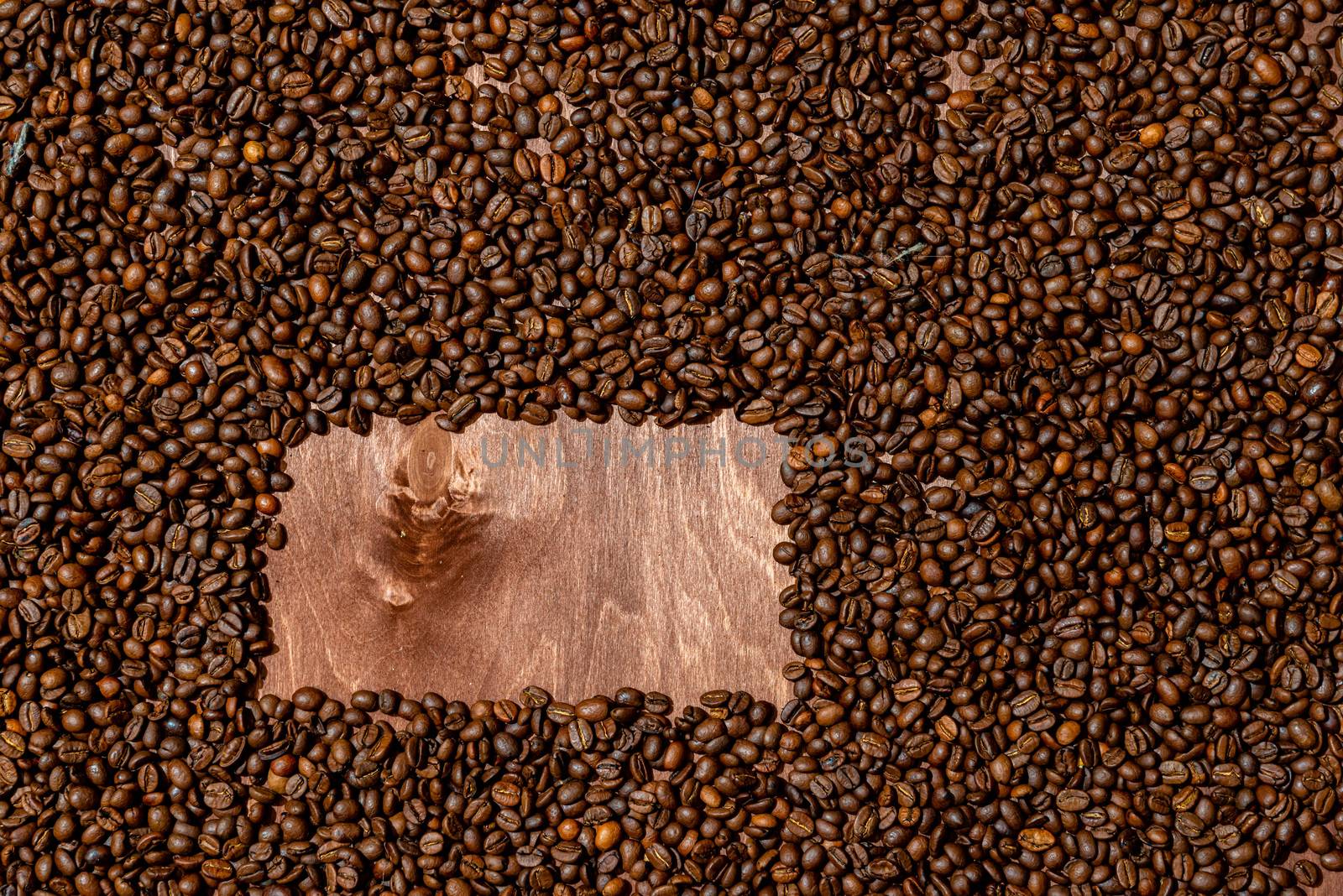Background texture of dark wooden  board and frame of coffee beans - image
