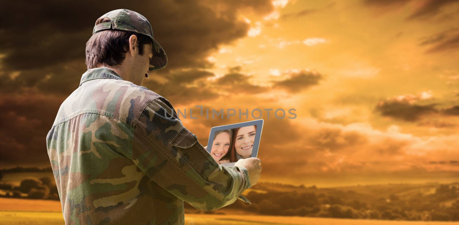 Composite image of army officer using tablet by Wavebreakmedia