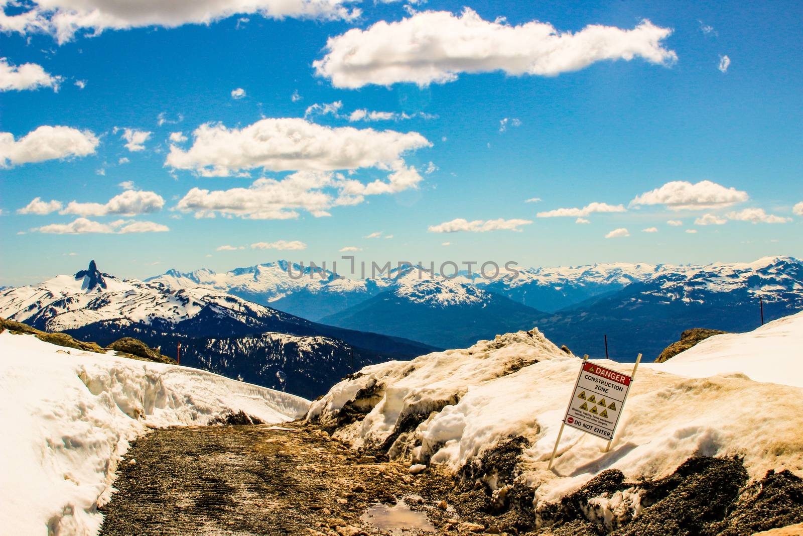 Cliff Danger Sign. A Danger Sign On The Edge Of Cliff On A Hiking Trail on Whistler Mountain by mynewturtle1