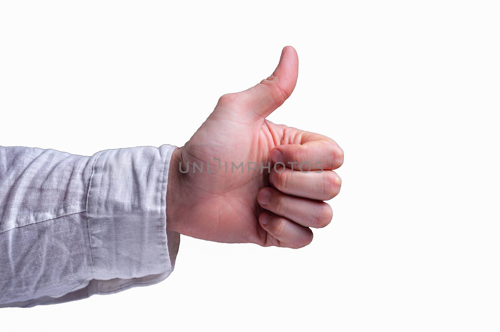 Hand of a man in a white shirt shows thumb signal, usually described as a thumbs-up sign on isolated white background