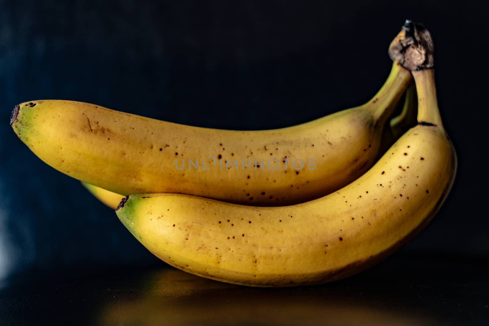 Group of bananas on a black background