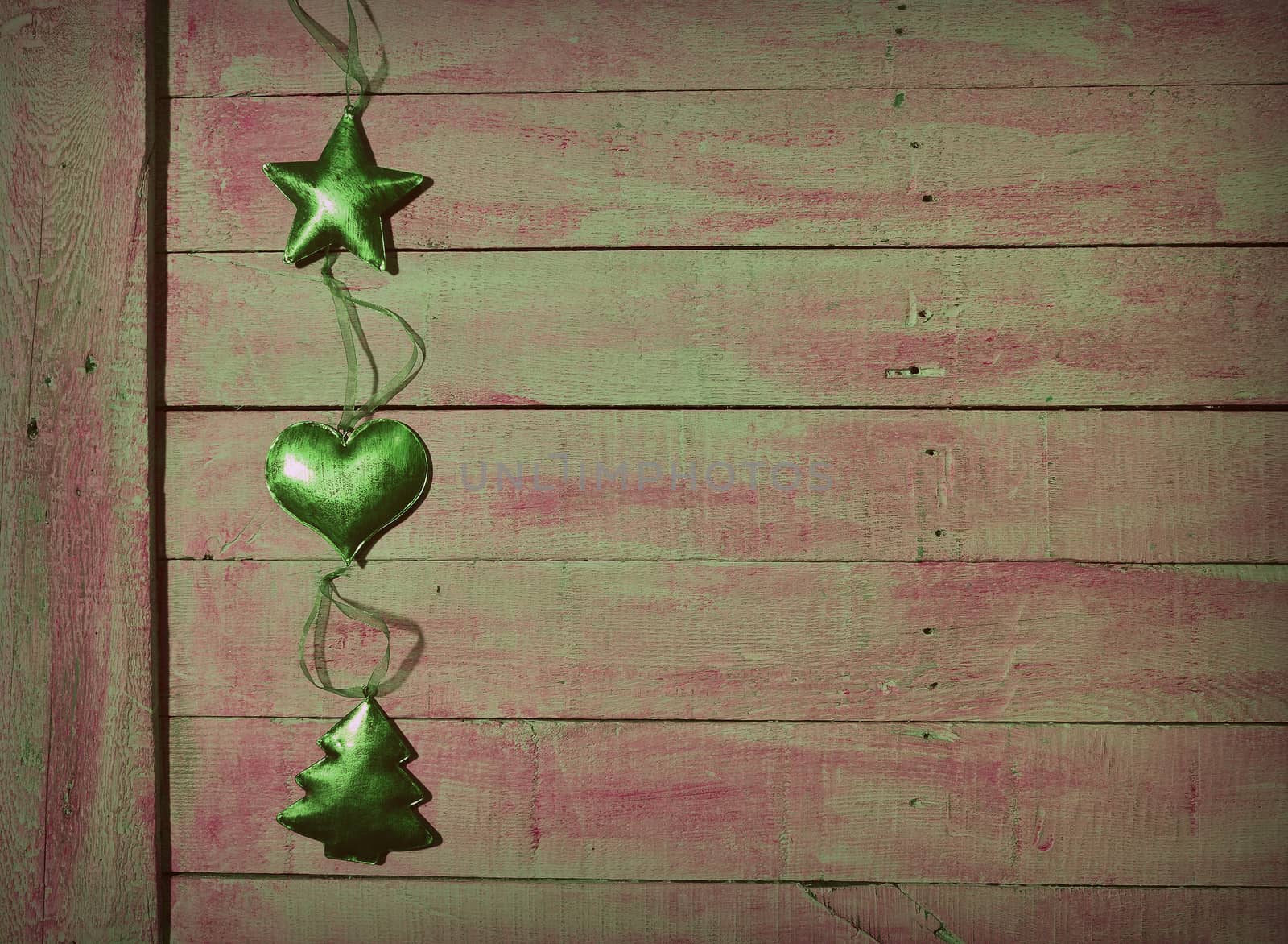 Christmas decorations over old wooden table.