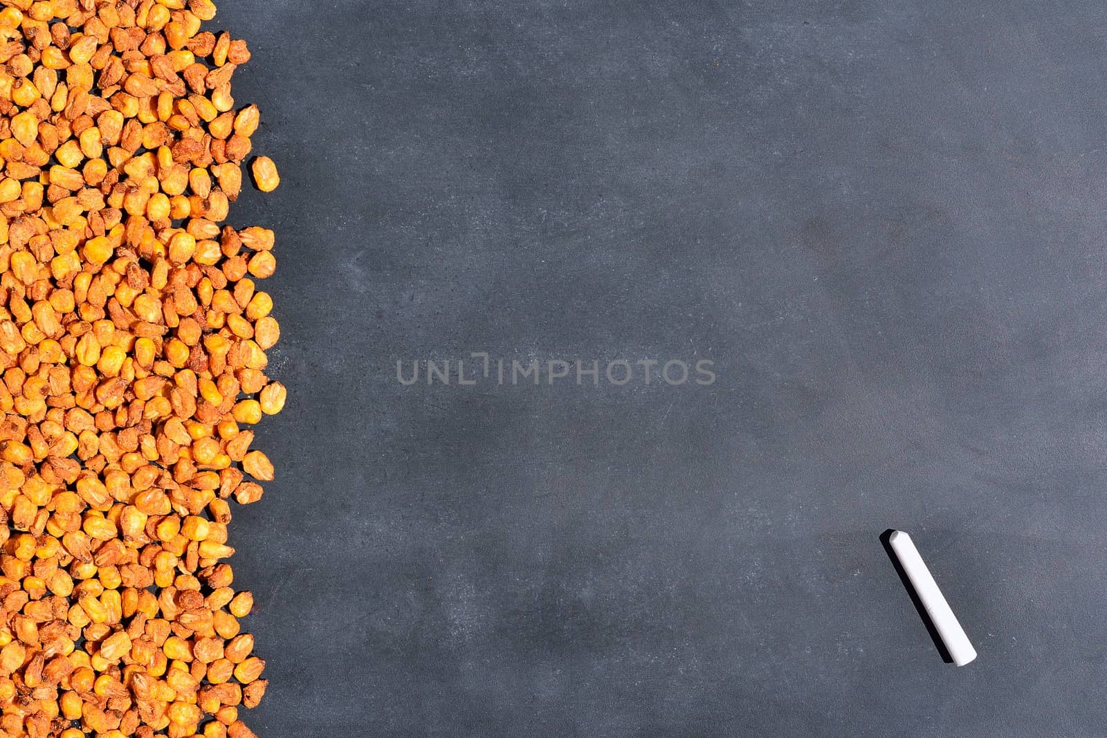 Toasted corn on the blackboard in the kitchen.