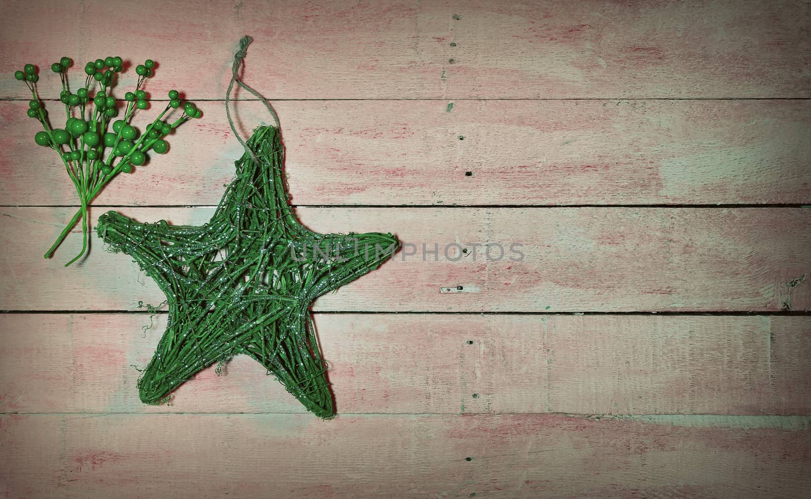 Christmas decorations over old wooden table.