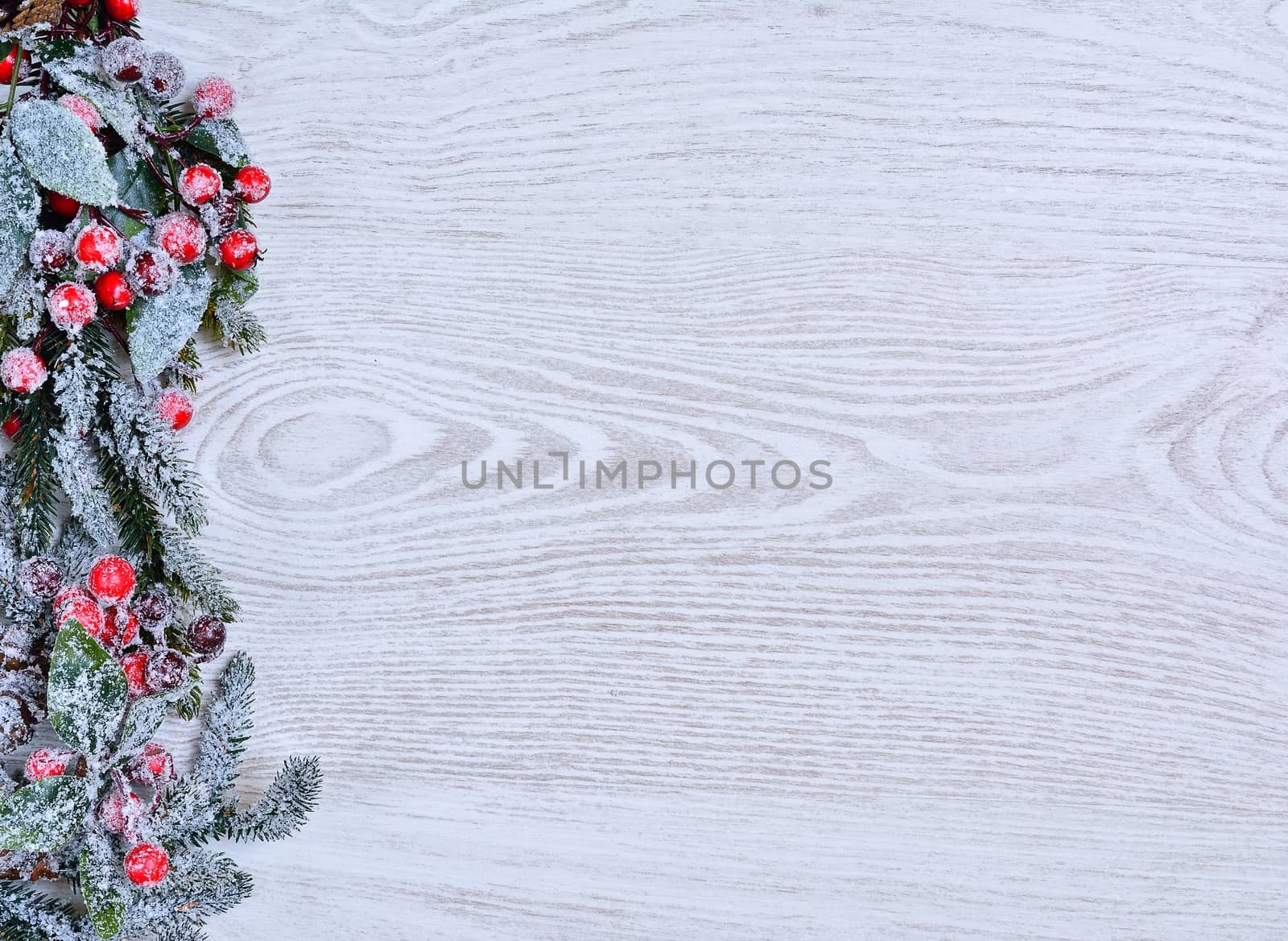 Christmas decoration full of frost on the wooden table