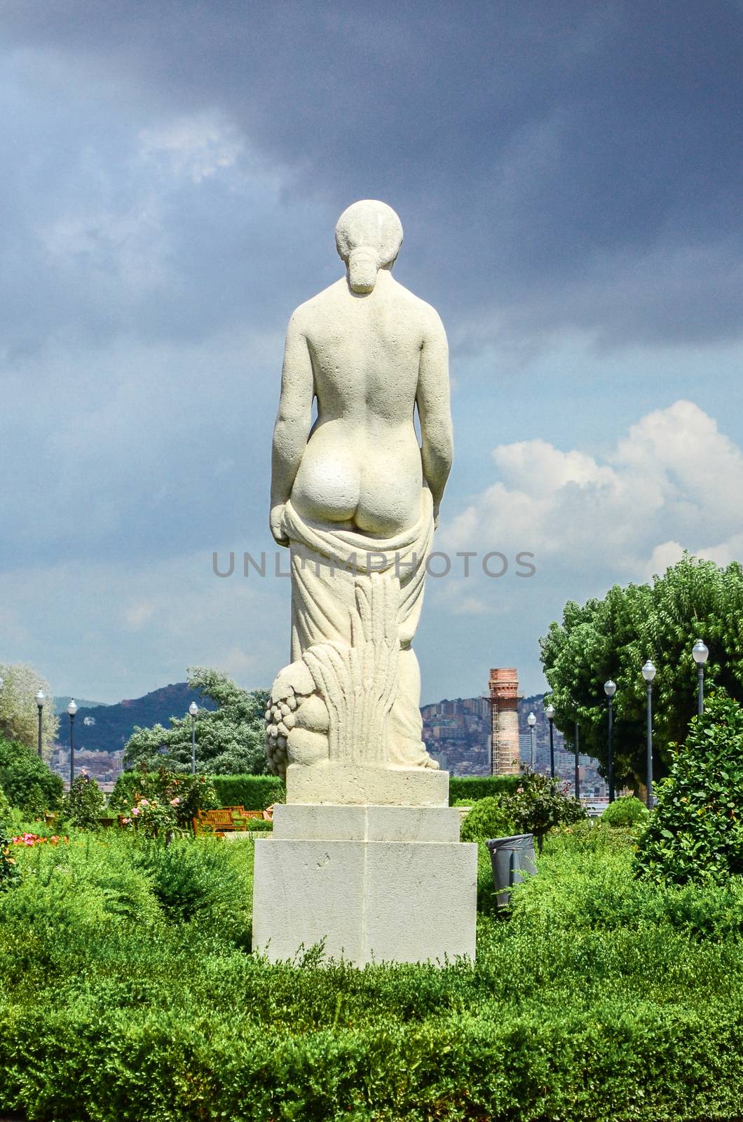 Rear view of a stone statue of a naked woman in Miramar on Mount Montjuïc. Barcelona, ​​Spain