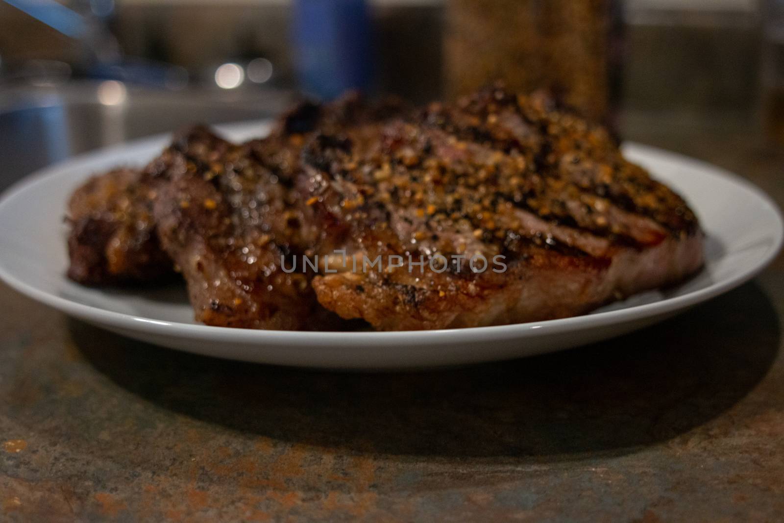 Steak that has been spiced with Montreal steak spice by mynewturtle1