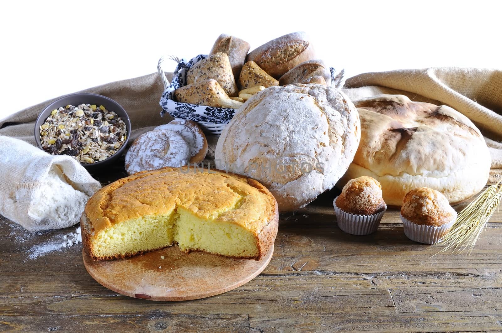 Assorted homemade bread on wooden table bakery