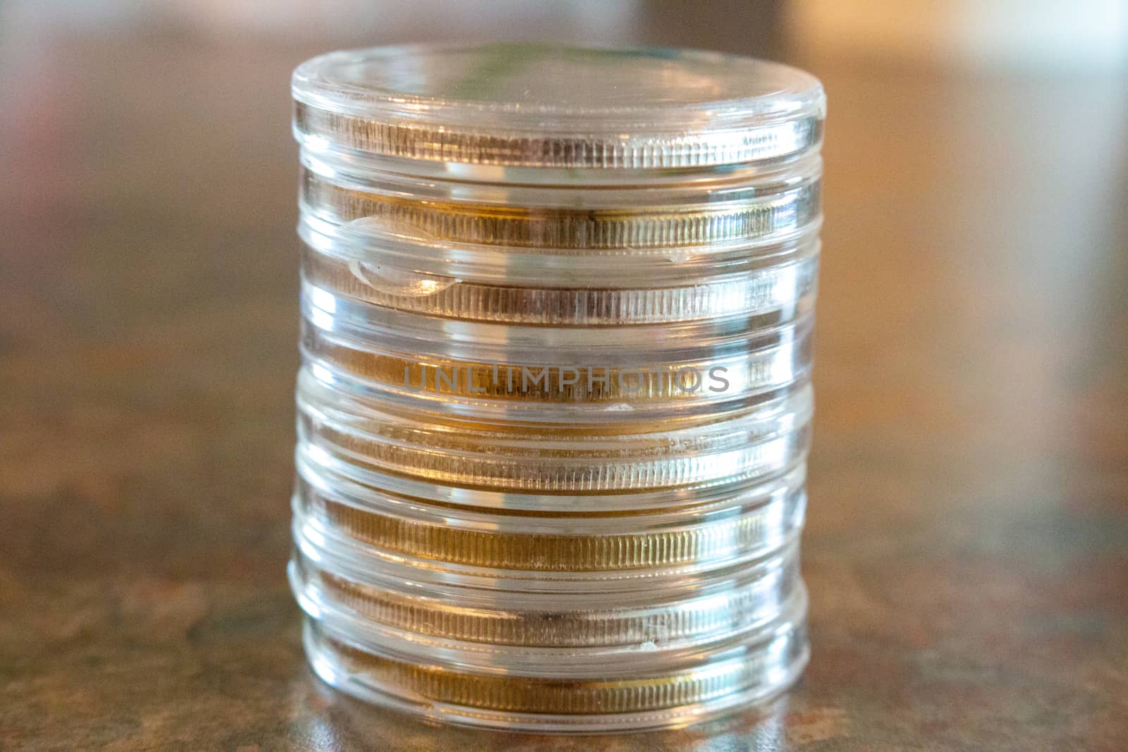 Wealth represented by silver coins and bars money. by mynewturtle1