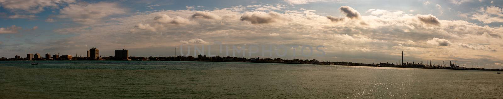 Port Huron Michigan in Panoramic format wide angle to show the industrial skyline. Nice autumn day by mynewturtle1