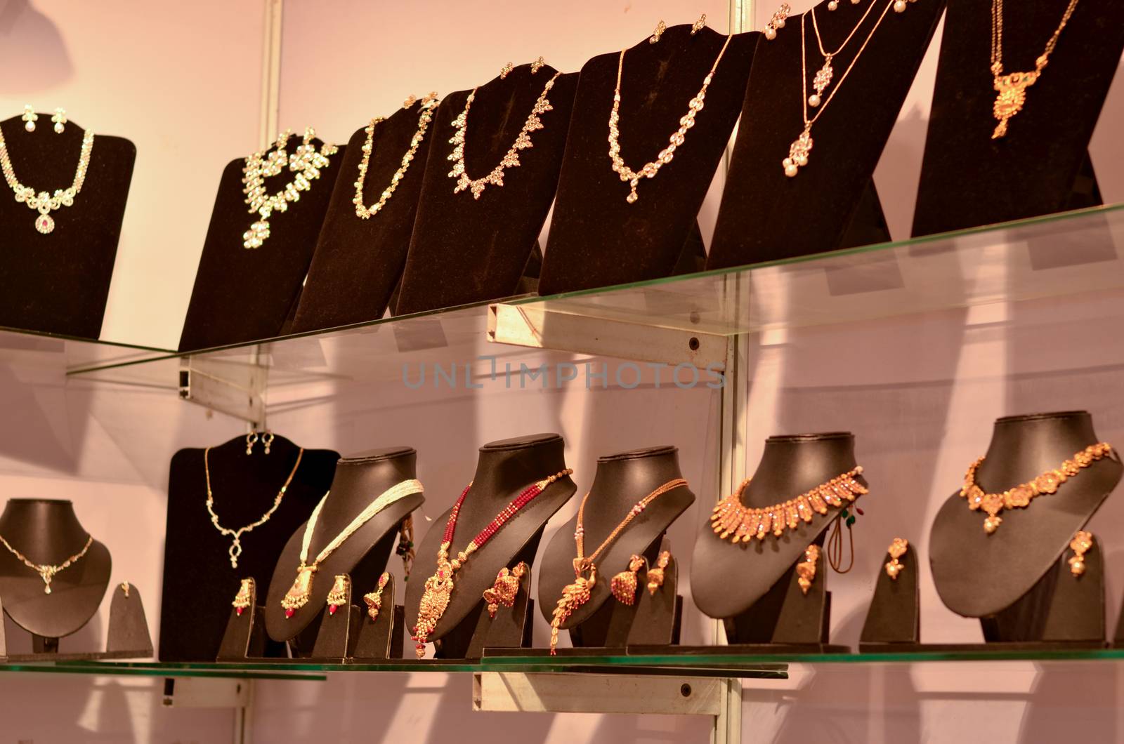 Designer gold and artificial jwellery on display at a wedding mela in New Delhi, India