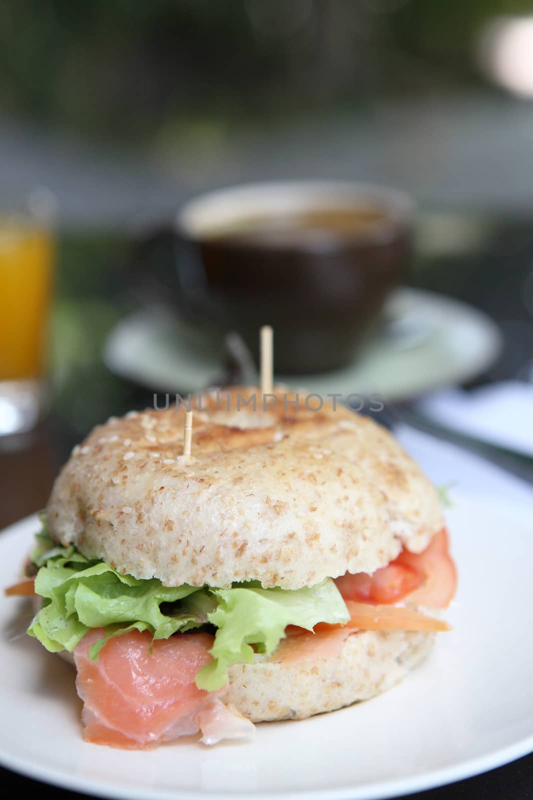 fresh bagel with salmon orange juice and coffee