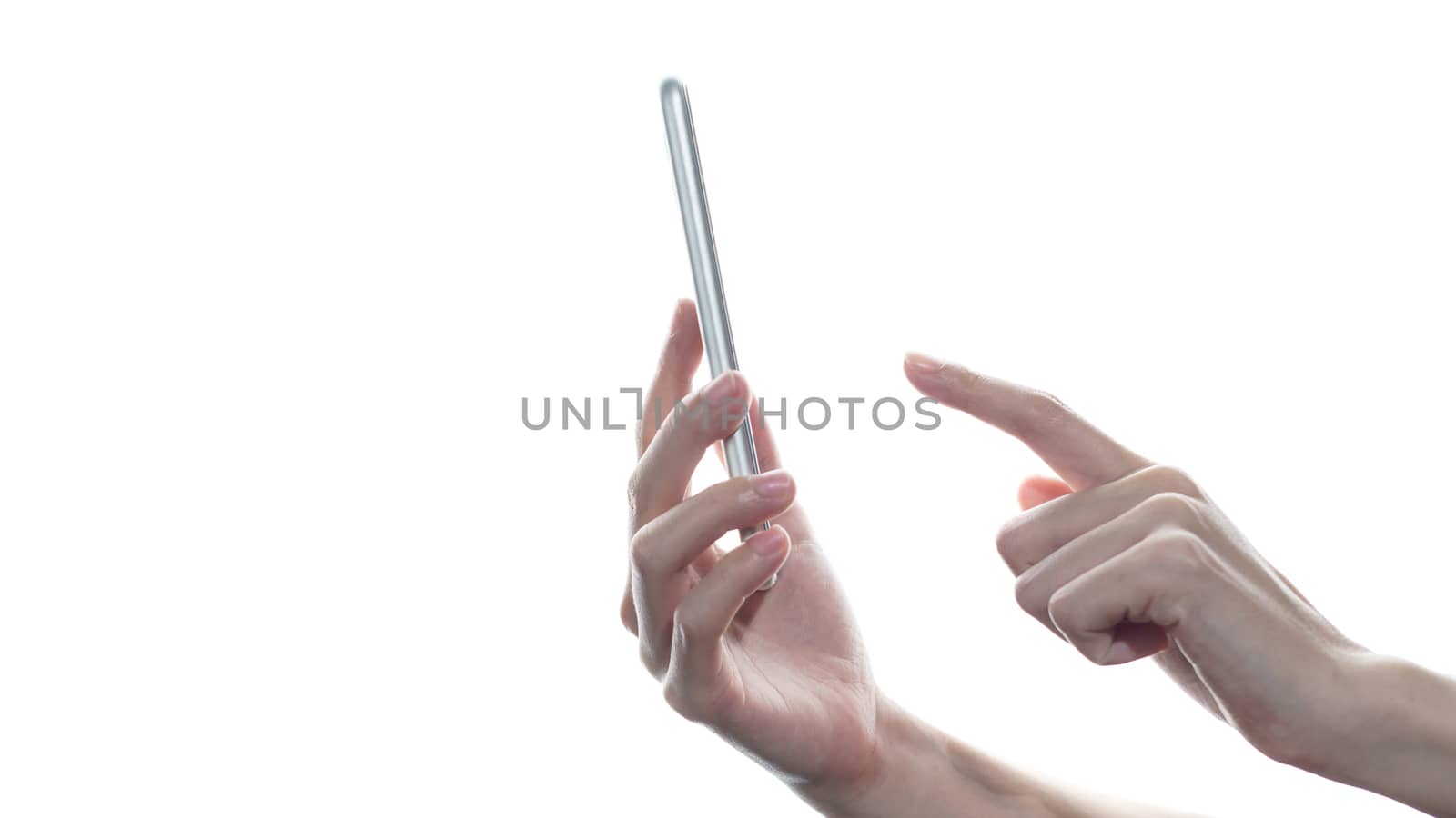 Side view of woman hand holding and touching smartphone isolated on white background.