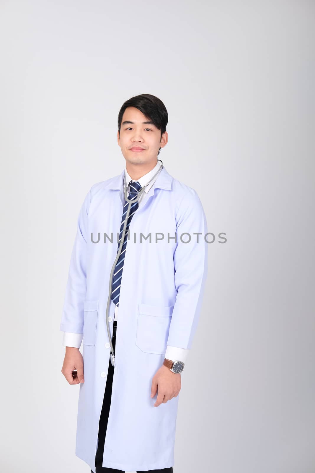 doctor physician practitioner with stethoscope on white backgrou by pp99