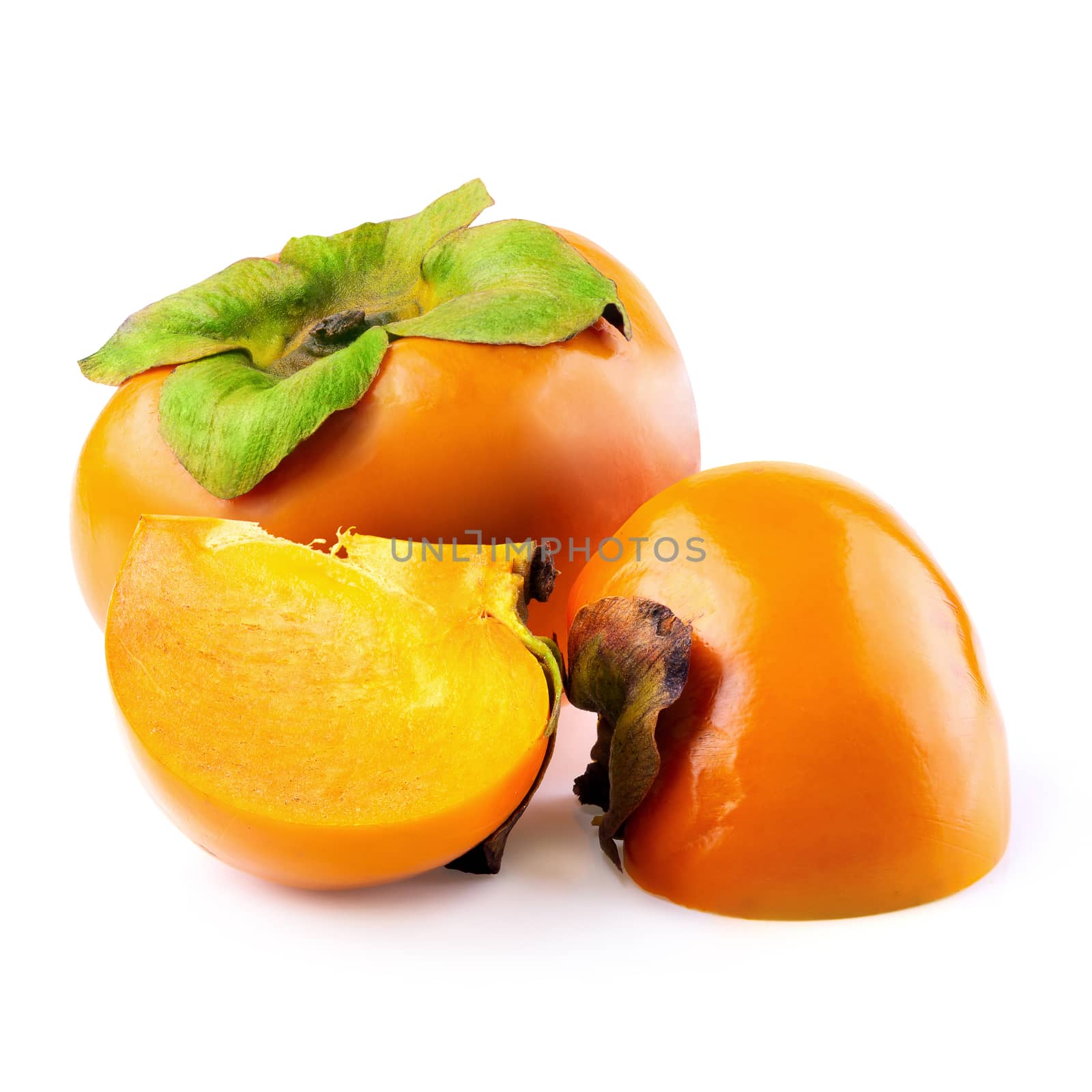 fresh persimmons and persimmon slice with leaf isolated on white background.